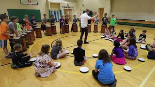 Teaching Kids To Watch The Conductor Using A Drum Circle