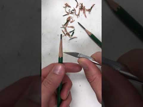 Sharpening a pencil with an Xacto knife