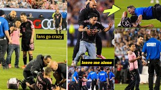 Lionel Messi's bodyguard stop match by SPRINTING to tackle fan who stormed the field
