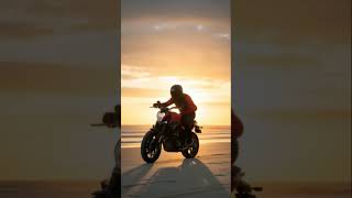 A Motorbiker Doing Wheelies In The Sunset