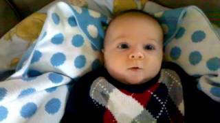 Making sounds in his argyle sweater