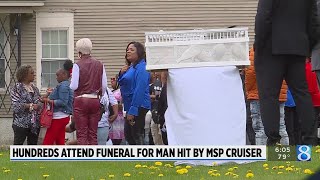 Hundreds attend funeral for man hit by unmarked cruiser