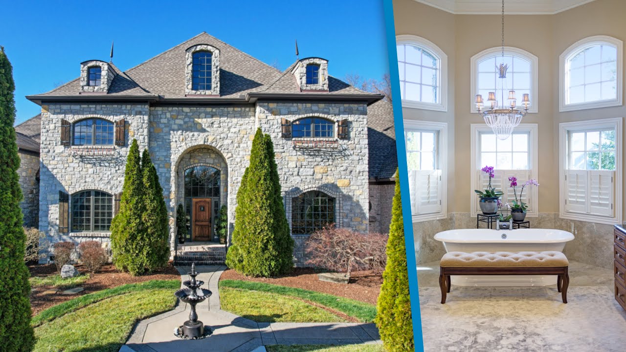 Stone-Brick Home Complete with Grand Foyer, Spiral Staircase, Sweeping Main Floor Owner's Suite