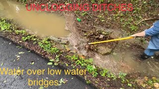 multiple whirlpools!/unclogging low water bridges and ditches after rain storm 06/2023