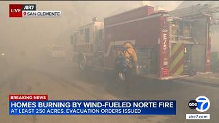 Norte Fire: Woman spots parents' burning home while watching fire coverage