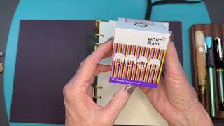 Unboxing my new MeePlus binder.  I'm so excited to get a look at this beautiful notebook system.