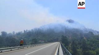 Raw: Firefighters Battle Blaze in Portugal