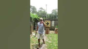 SOG Fasthawk Tomahawk thrown at targets in the board