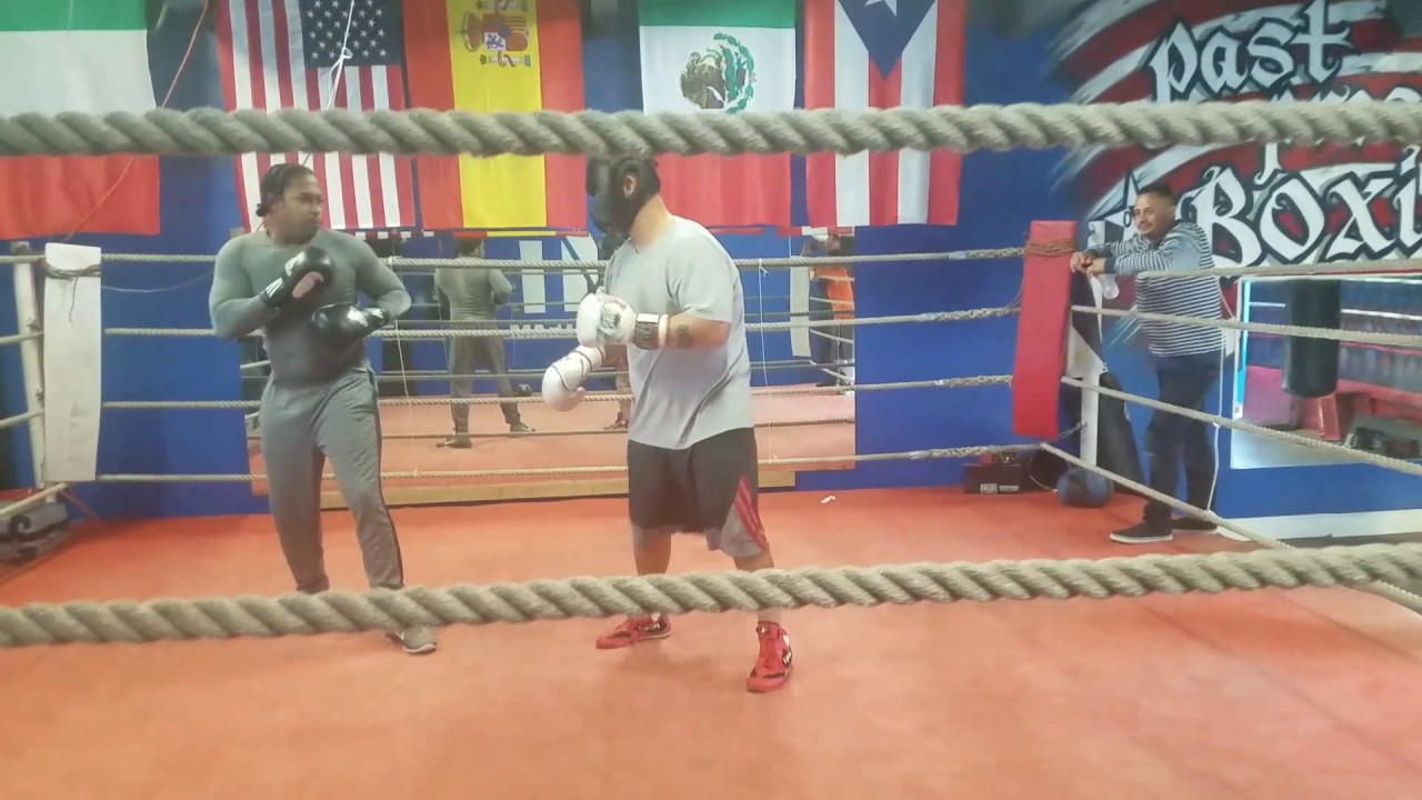 Dude sparring with no head gear