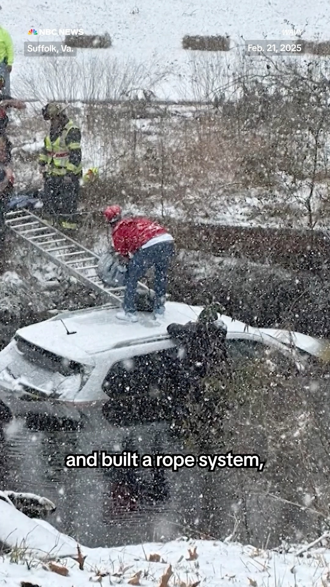 First responders conduct a snowstorm water rescue after a car crash