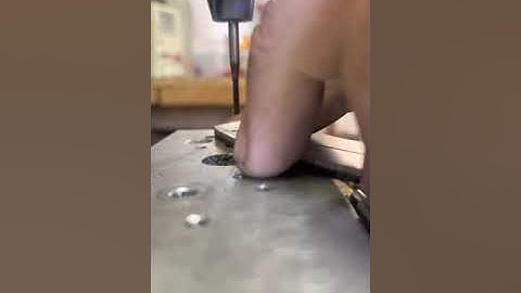 How I tap titanium thru holes, using a mill.