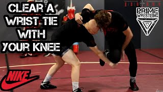 How to Clear a Wrist Tie with Your Knee in Wrestling - Hand Fighting