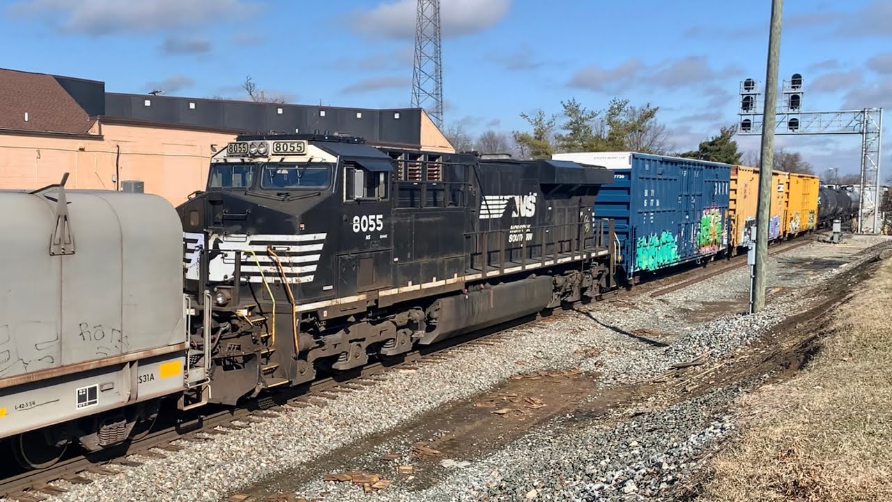 2 Mile Long Train Blocks Main Crossing In Town, Stopped. Manned Pusher Shoves Train Up Hill, Returns