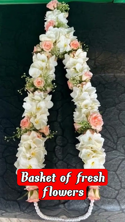 Bouquet of fresh flowers. Garland of raw flowers of the bride and groom