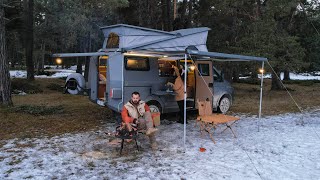 MOTORHOME CAMPING ON AN ICY LAKE