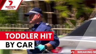Toddler airlifted to hospital after being hit by car | 7NEWS