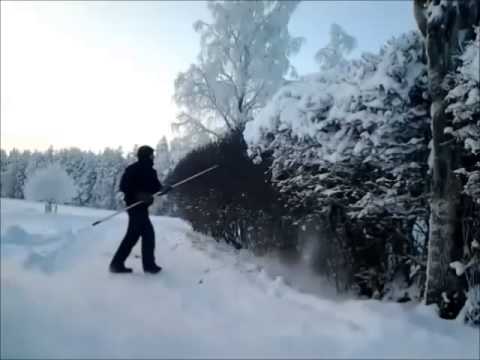 Heavy Snow Removal Of The Hedge.