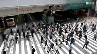 蔓延防止等重点措置始まる　通勤時間帯の大阪駅前の様子