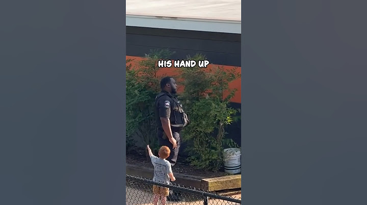 Heartwarming Moment: Little Boy's Respectful Gesture to Police Officer ❤️ #shorts