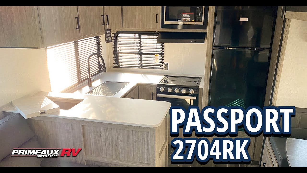 2023 Passport 2704RK - Rear Kitchen Travel Trailer - Primeaux RV - YouTube