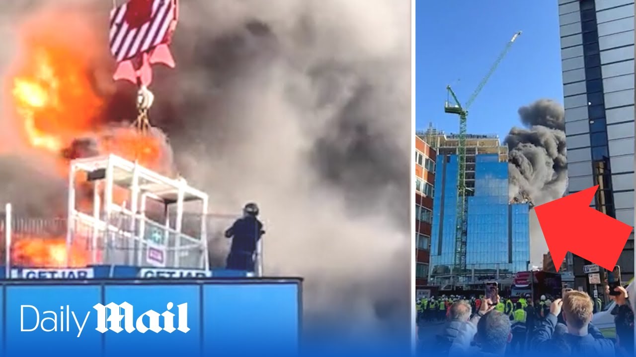 Incredible towering inferno rescue: Hero crane operator saves man from burning tower in Reading