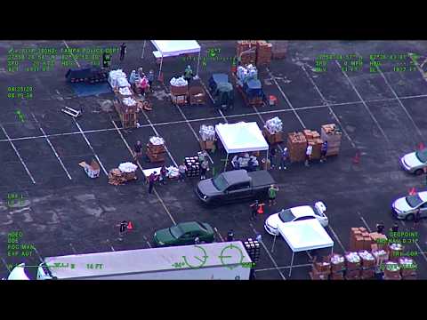 Hillsborough mega pantry distributes food at Raymond James Stadium