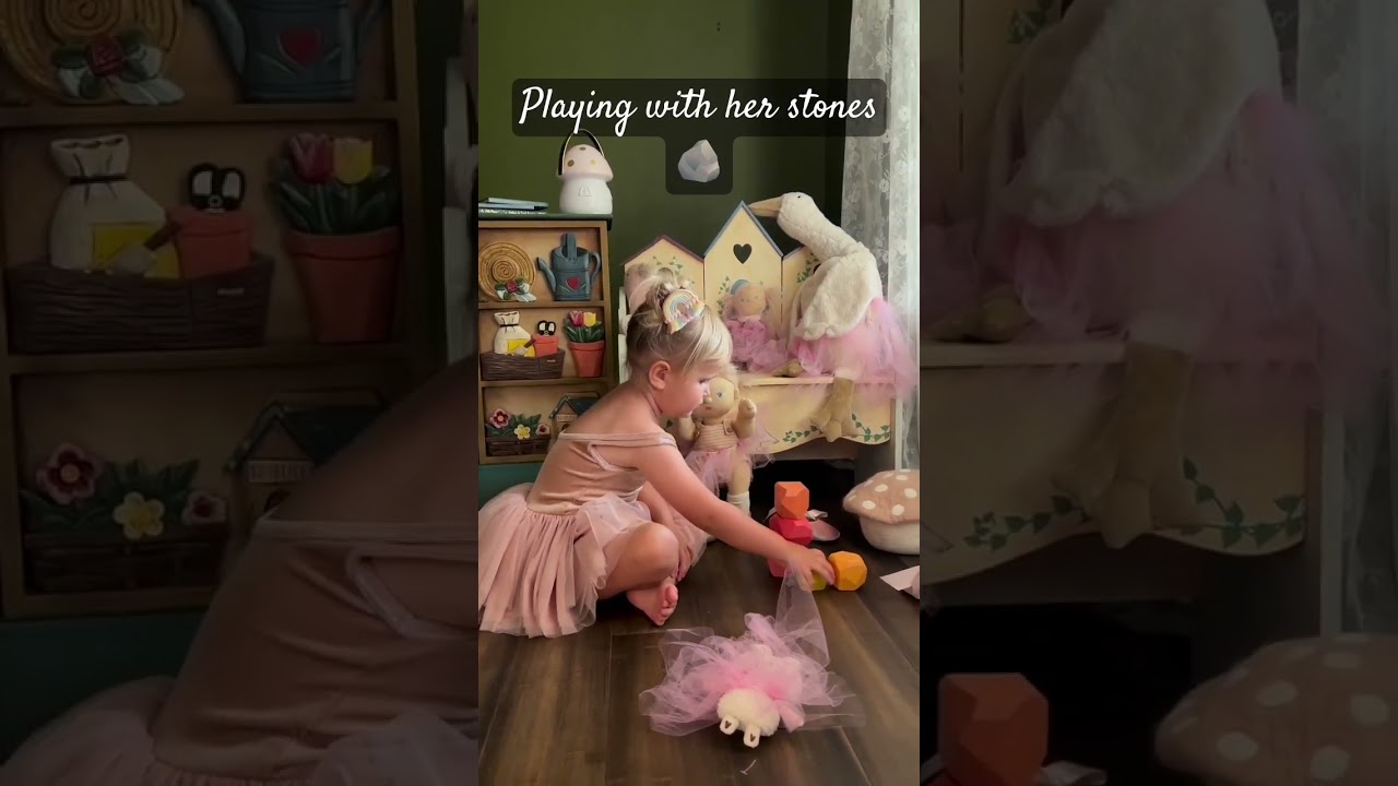 Cutie playing with her 🪨 