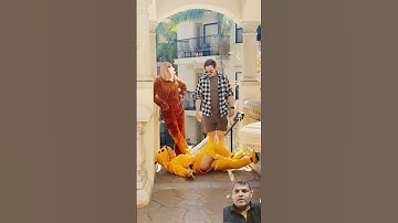 features in a sleek, minimalist design. It features a flexible OLED display that wraps around the