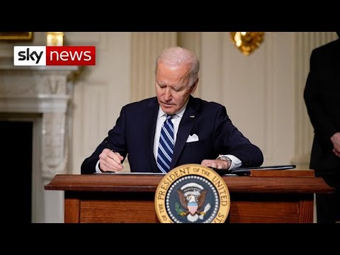 Biden takes on big oil in fight against climate change