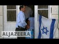 Ref:5D5-0bKtwuY Israeli settlers seize palestinian family homes in hebron