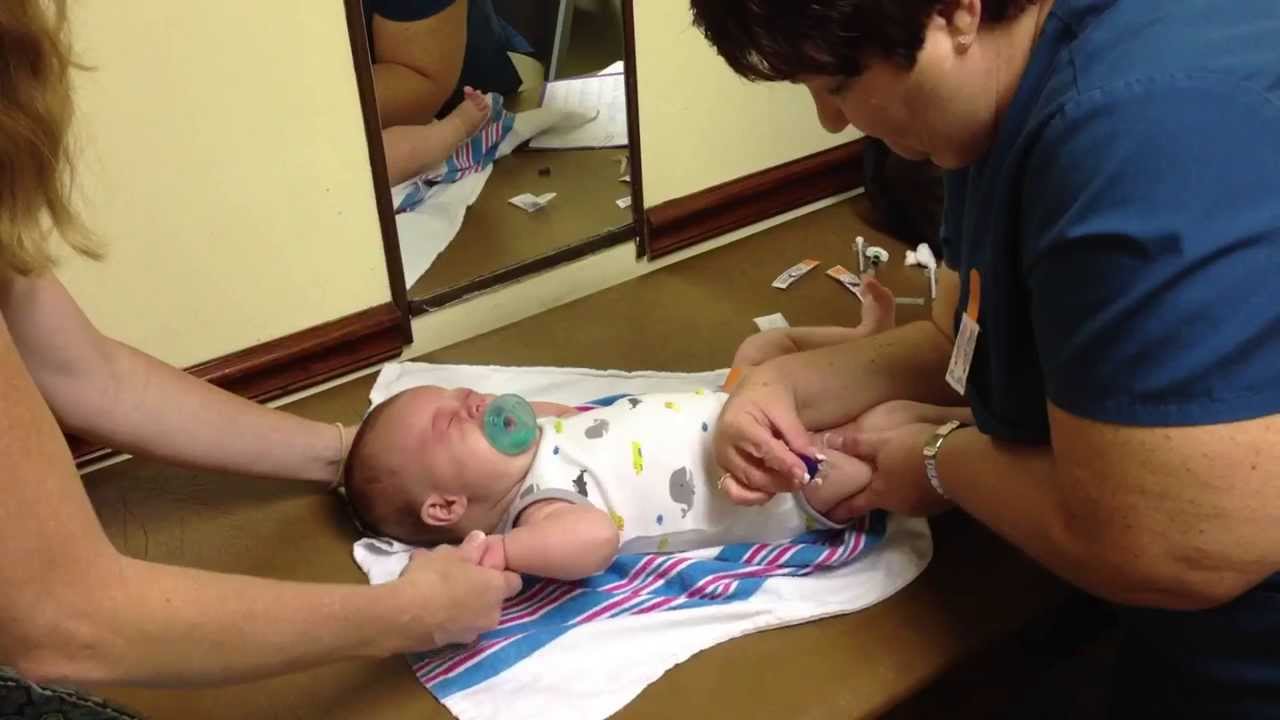 Johnathan getting his 2 month shots. 09/11/13