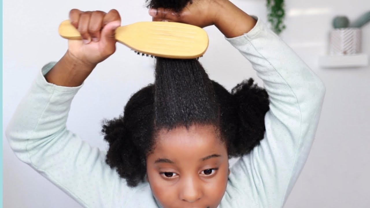 May 9, 2020, Nairobi, Kenya: Stacy Ayuma uses her hair style braids to  create awareness and sensation on Coronavirus (COVID-19)..Little girls from  Kenya are using their hairstyles to spread awareness and sensation