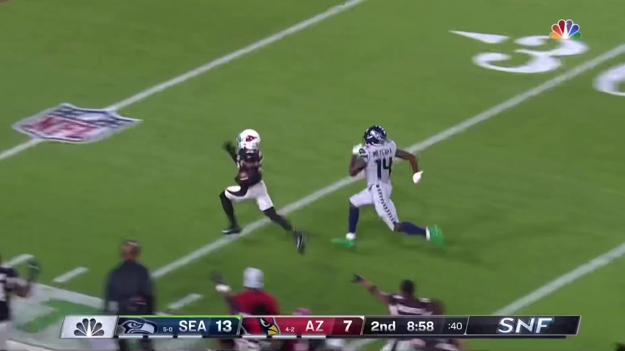 DK Metcalf touchdown saving tackle on budda Baker