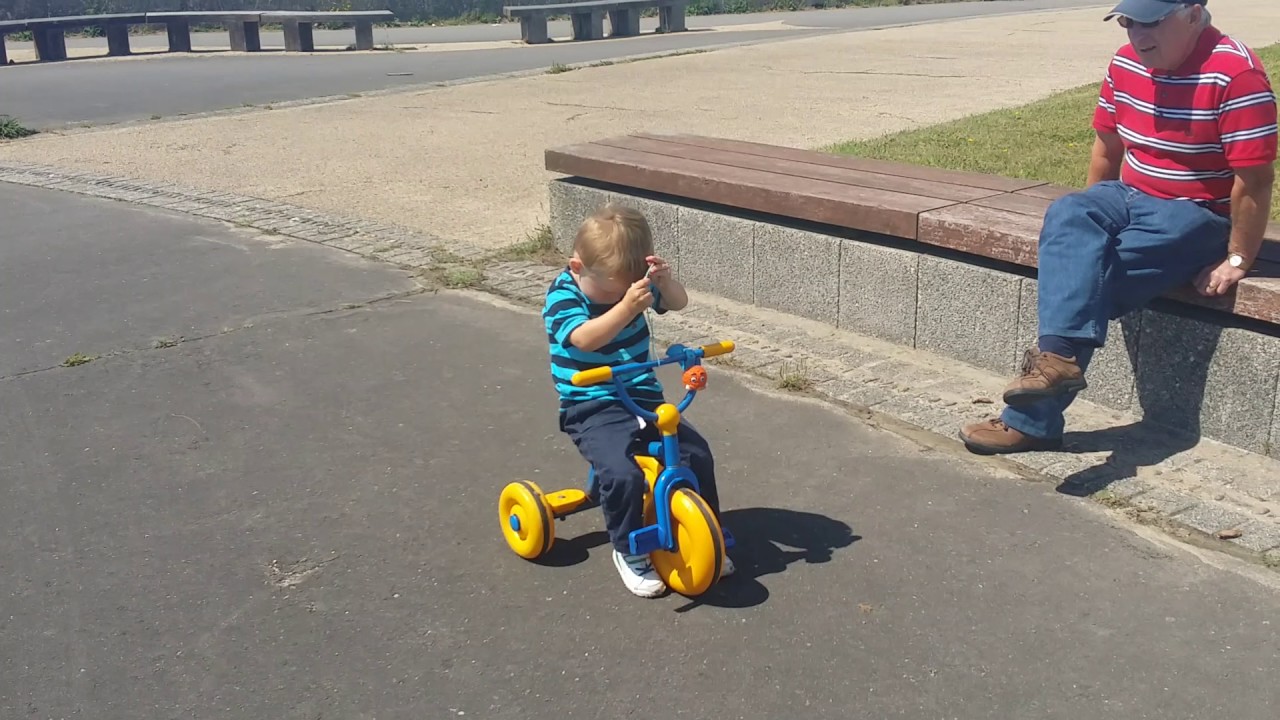 2 year old riding tricycle
