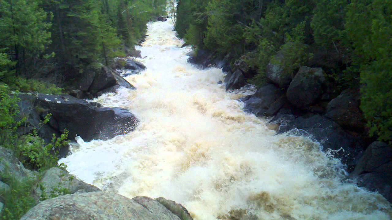 Raging Poplar River after 4 inch rainfall