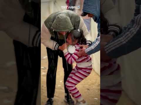 Palestinian girl cries in fear as she confuses thunder with air strikes in Gaza