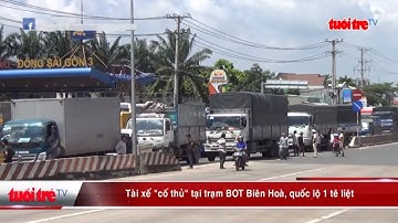 Tài xế “cố thủ” tại trạm BOT Biên Hòa, quốc lộ 1 tê liệt | Truyền Hình - Báo Tuổi Trẻ
