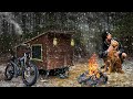 Braving snow  bitter cold in a bike camper with my dog