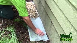 Rock Barrier Next to House Foundation made Easy by Weed Recede