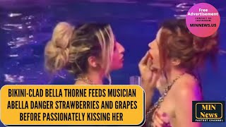 Bella Thorne feeds Abella Danger strawberries and grapes before passionately kissing her