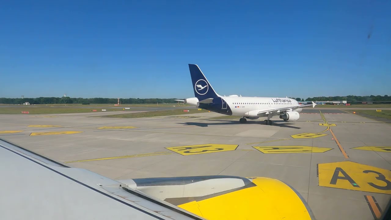 Vueling Airbus 320 take off from Hamburg Airport