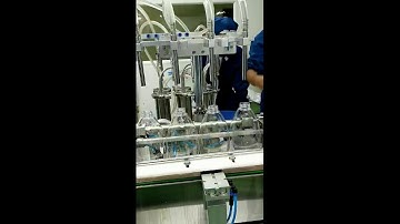 Máy chiết rót chai sữa tắm, dầu gội đầu, nước rửa chén bằng pistong