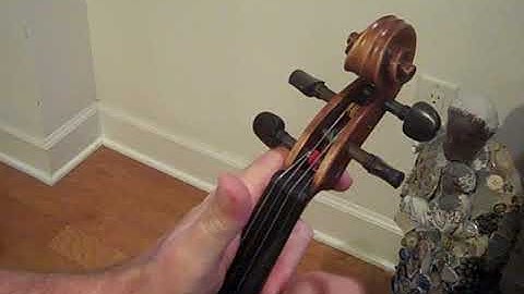 Tips for setting violin pegs after weather changes.
