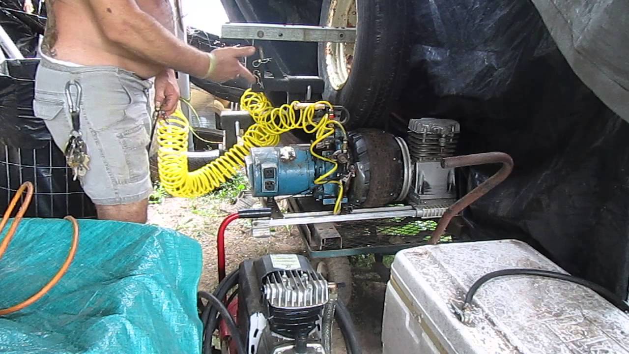 Compressed air powered, flywheel assisted AC generator ...