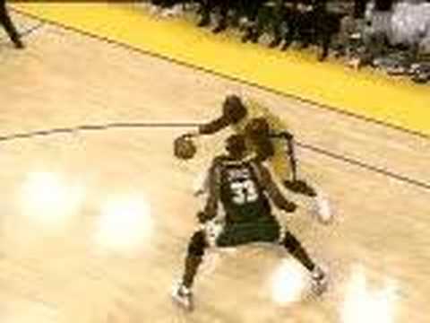 Shaq crossing Jerome James of the Sonics with a crossover then dunking it home.