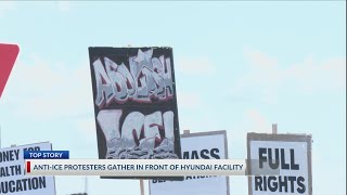 Anti-ICE protesters gather in front of Hyundai facility