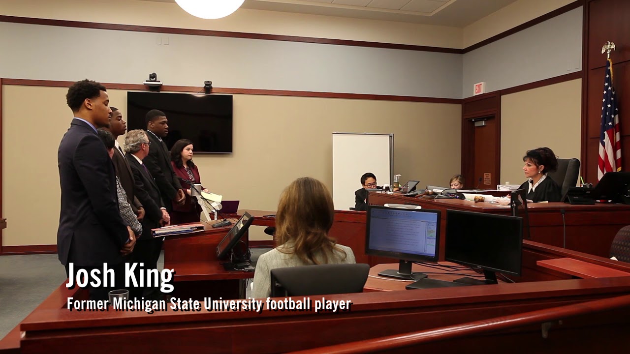 Judge rebukes ex-MSU football players in 'seduction' plea