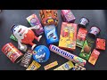 100 candies opening, chocolate a video, lots of chocolates, Cadbury celebration, surprise toys