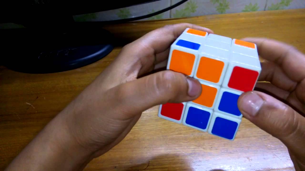 How to solve the first layer of a rubik's cube - YouTube