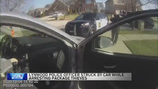 Alleged package thief charged, accused of running over suburban police officer